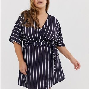 Wrap dress with fluted sleeves in stripe